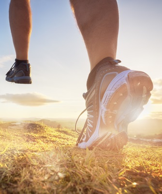 Cross-country running in early morning sunrise